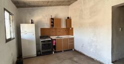 CASA DOS DORMITORIOS A TERMINAR ESTANCIA VIEJA FRENTE AL RÍO LOS CHORRILLOS