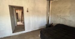 CASA DOS DORMITORIOS A TERMINAR ESTANCIA VIEJA FRENTE AL RÍO LOS CHORRILLOS