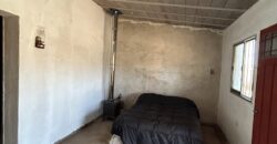 CASA DOS DORMITORIOS A TERMINAR ESTANCIA VIEJA FRENTE AL RÍO LOS CHORRILLOS