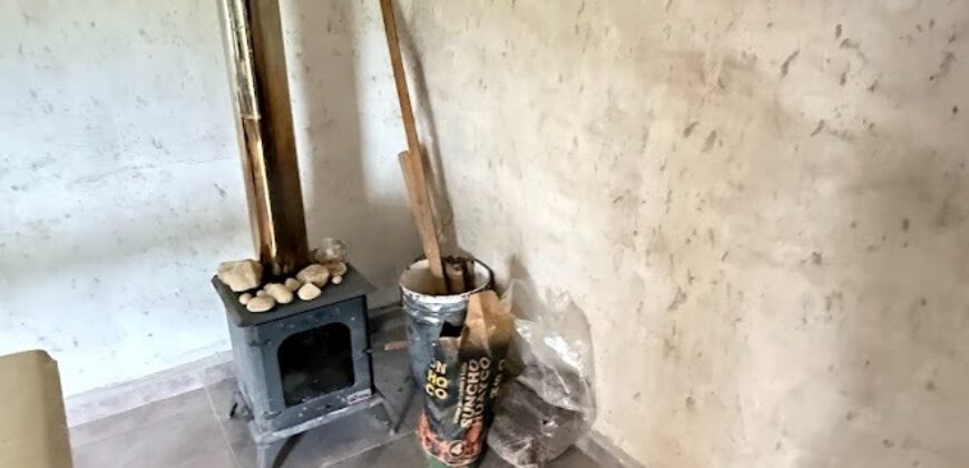 CASA DOS DORMITORIOS A TERMINAR ESTANCIA VIEJA FRENTE AL RÍO LOS CHORRILLOS